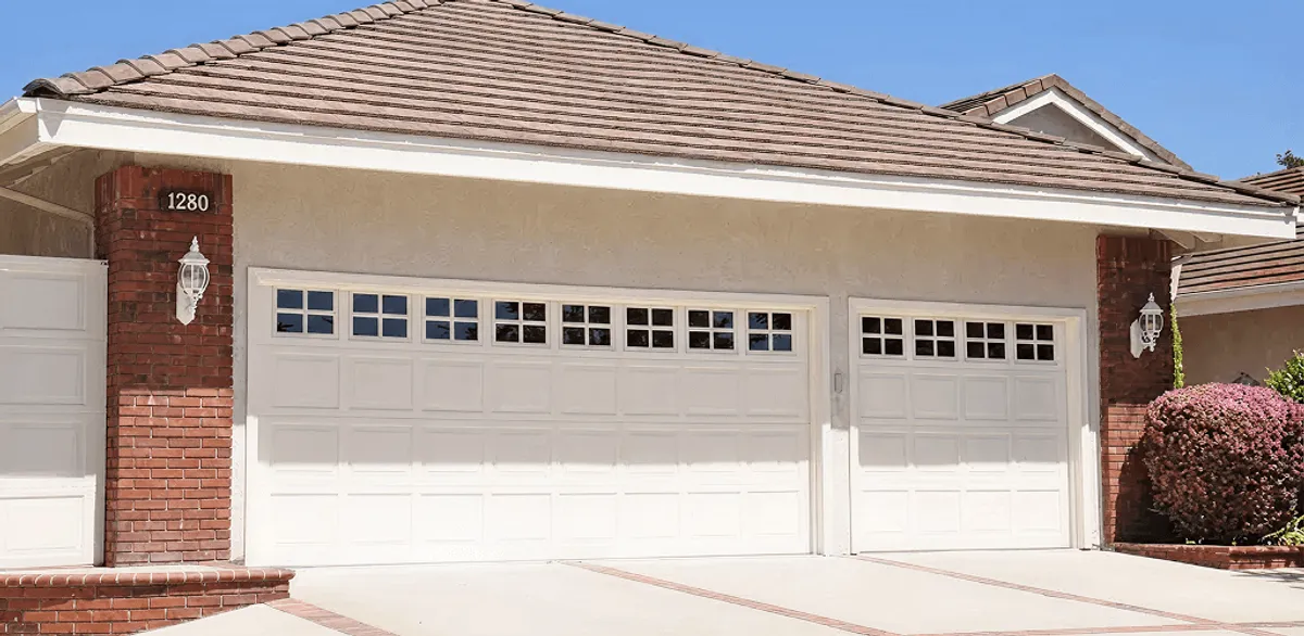 Residential garage door repair service for a double garage door in Riverside, CA